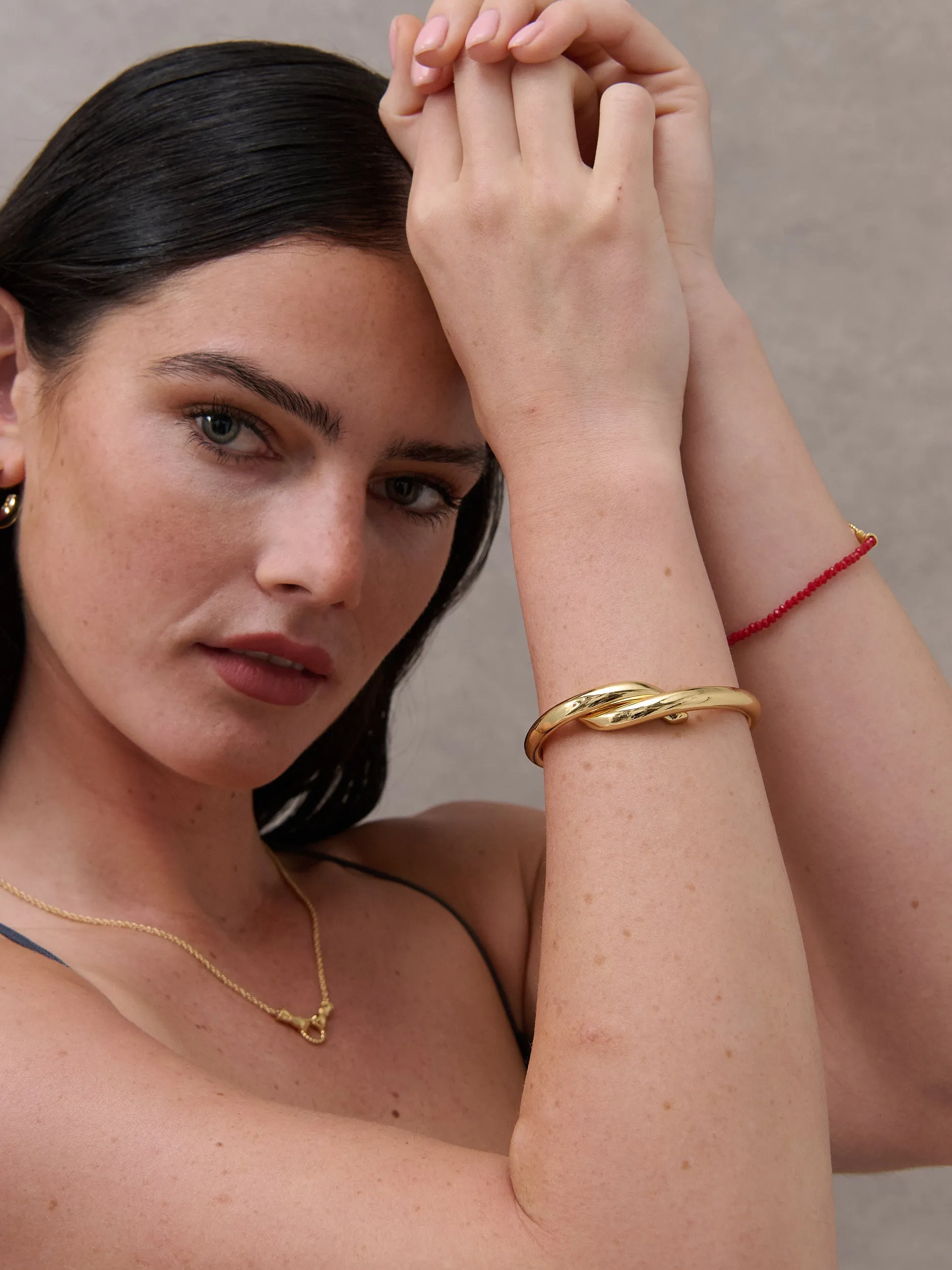 Interlock Twist 18K Gold Plated Bangle