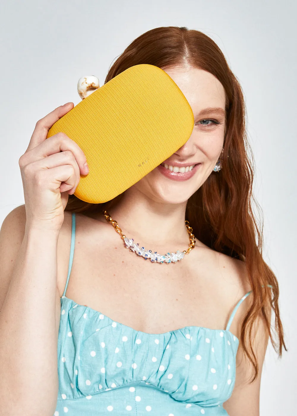 ROSI CLUTCH W/ SHELL CLOSURE