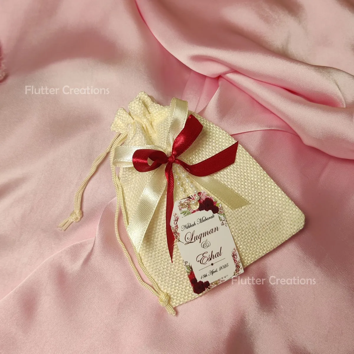 White Jute Pouch with two Ribbons & Tag